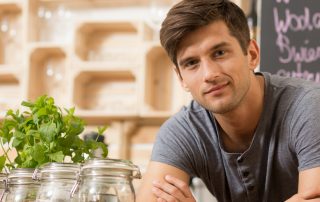 Young man working in restaurant