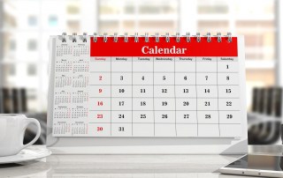 Calendar and a cup of coffee, office background. 3d illustration