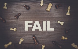 fail concept on wooden background